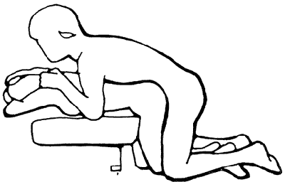 Figure 6 - The woman kneels her upper body supported by furniture. Her knees can be supported by a pillow. May be helpful when the woman has hip problems. Not good if shoulders are involved.